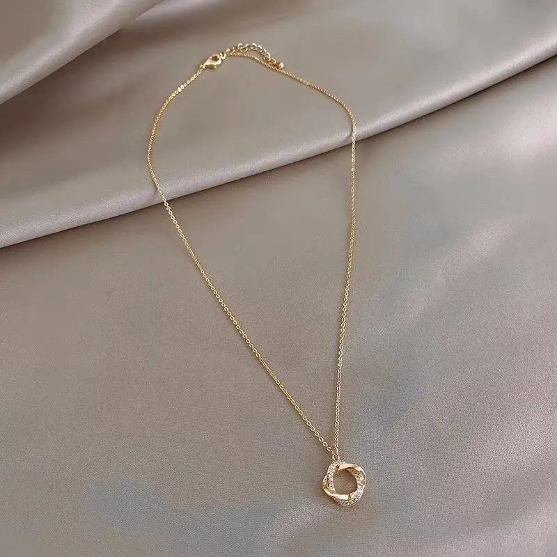 Elegant Gold-Tone Twisted Pendant Necklace