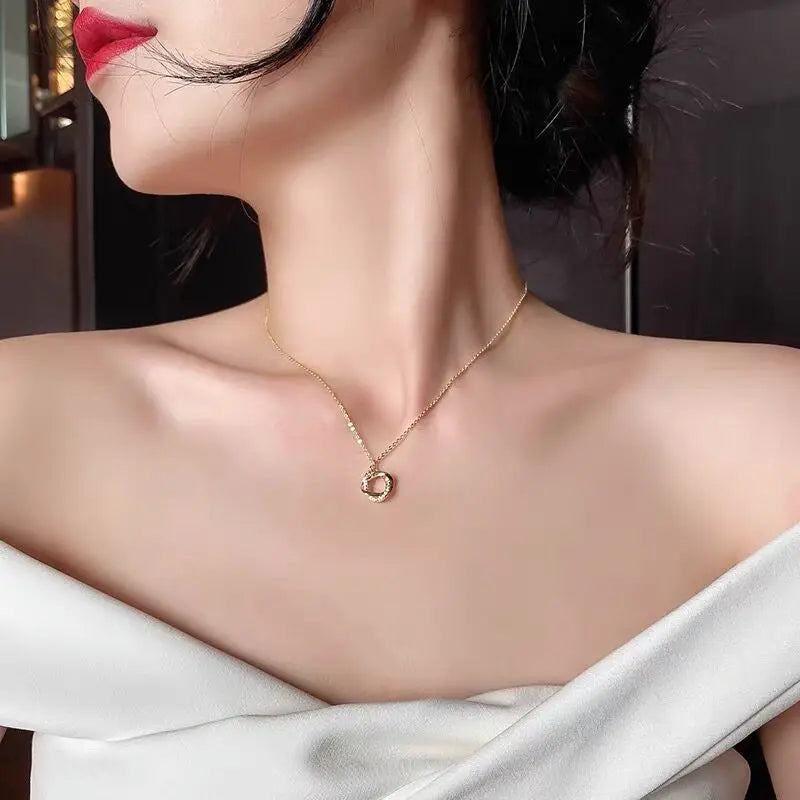 Elegant Gold-Tone Twisted Pendant Necklace